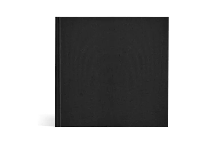 Leather Photo Books|Leather Photo Books|Custom made photo album open on table with photo collage of family photos|Wedding and bride photos in custom printed photo album by Printerpix|Couple look at leather cover custom photo book made by Printerpix|Old couple print large custom photos in leather photo album book|||||