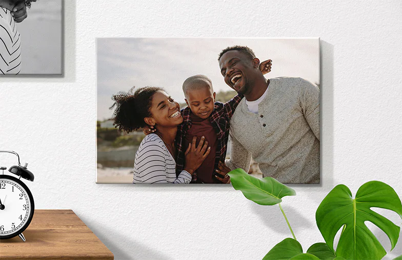 Personalised Photo Canvas Prints by Printerpix|Collage canvas print of two delighted female friends|canvas print sizes|mother affectionately kissing her little son on canvas print|gallery wall of canvas prints|Canvas print of a couple enjoying their holiday|||||