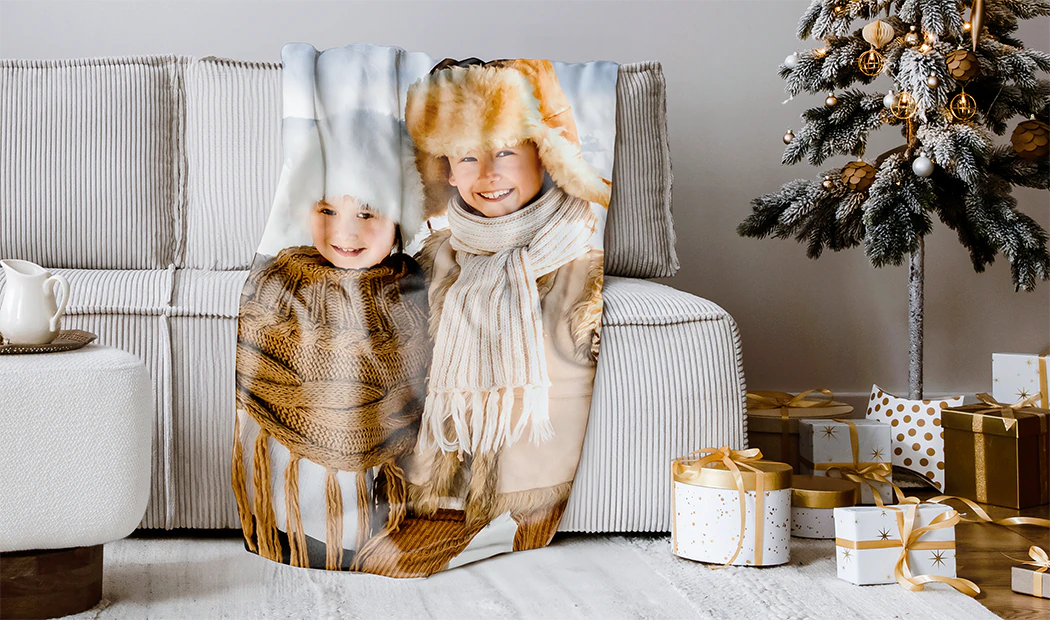 Mink Touch Photo Blanket by Printerpix|Personalised photo blanket: Mum and baby snuggle on a brown sofa.  A unique, cherished keepsake.|Personalised fleece, cosy fleece, sherpa & woven layers.  Luxury blanket with unique fringed edges.|Layers of fleece, cosy fleece, sherpa & woven fabric.  Cosy, personalised comfort.|Soft fleece, cosy fleece, sherpa & woven fabrics stacked.  Personalised comfort, your perfect texture awaits.|Personalised photo blanket: cherish memories, UK handmade. Fast shipping & free returns.|Cosy personalised photo blanket.  Multiple sizes available. Features family photos in a festive design.|Personalised fleece blanket: premium fabric, high-definition print, fully customisable.  Perfect gift!|Personalised mink & sherpa blankets: kids' faces printed on super-soft fabric.  Unique gifts!||